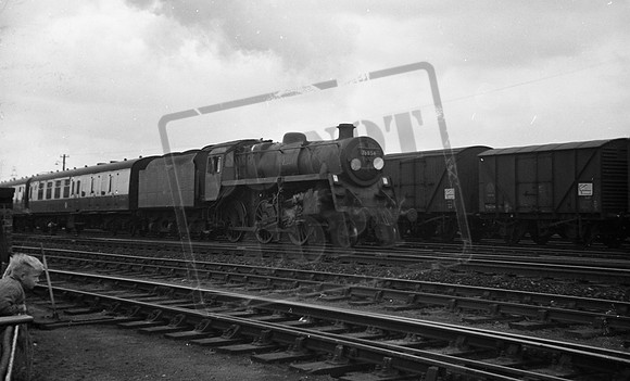 76054 1960c Departing Salisbury eastbound   (subway bridge parapet left)-ROneg-1706-364