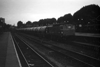 6597 1970-06-22 Kensington on southbound cement empties at 21.30 stopping to pick-up fitters who had been working on 6517-ROneg-025