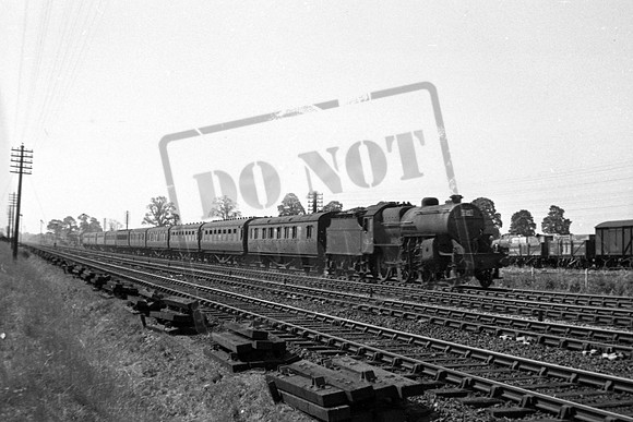 42897 1949-08-13 Naas Crossing on Paignton-Newcastle-ROneg-1902-BWB-408