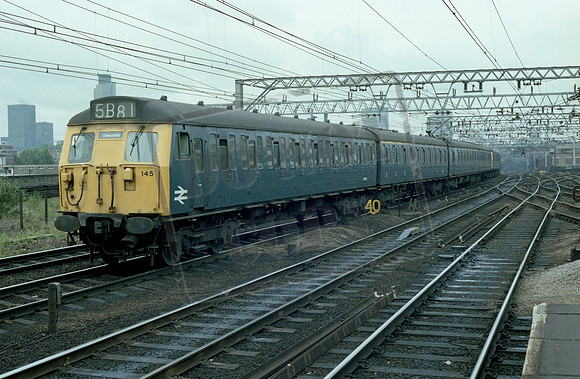 EMU ER 145 held at lights Bethnal Green