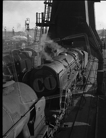 70047 1960s Crewe North with fire being dropped-ROneg-JC37-023